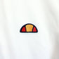 ELLESSE Polo Shirt White | Medium
