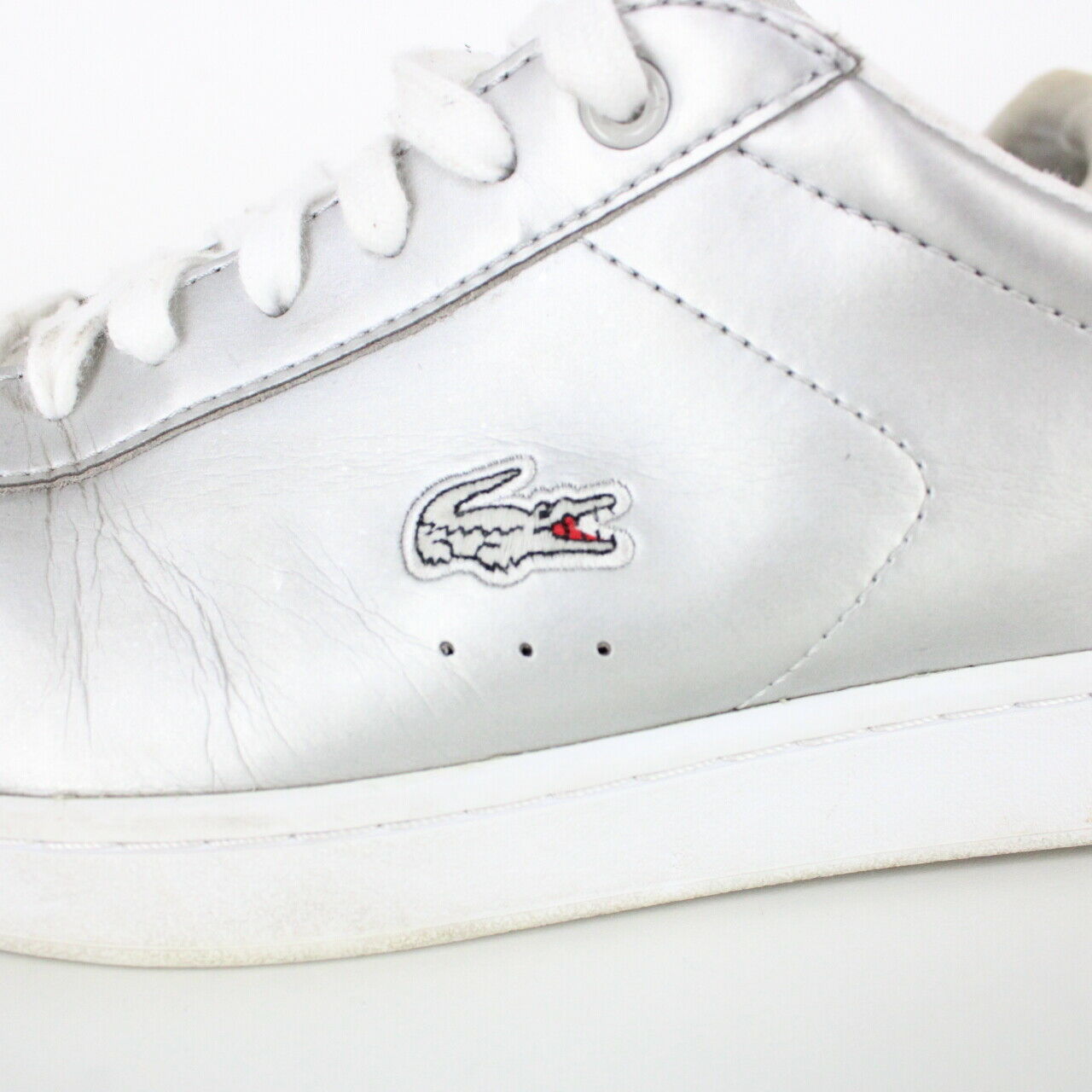 Womens LACOSTE Carnaby Evo Trainers Silver | UK 6